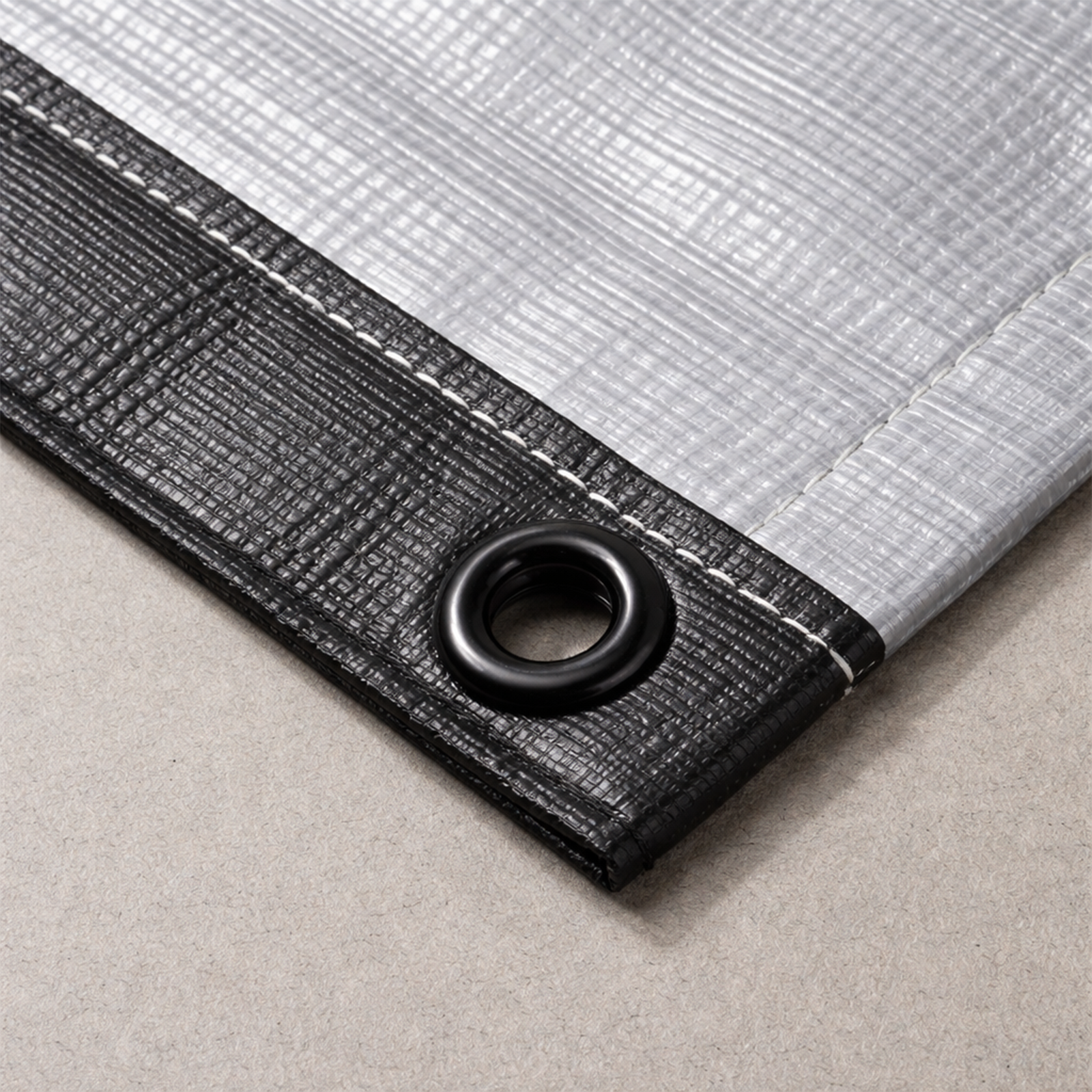 GRUNT 12mm Black Webbing Grommets 50-Pack – bulk pack of black-finish grommets for tarps, canvas, and fabric reinforcement. Strong and easy to set with matching punch tool. Available at Bunnings AU and NZ.