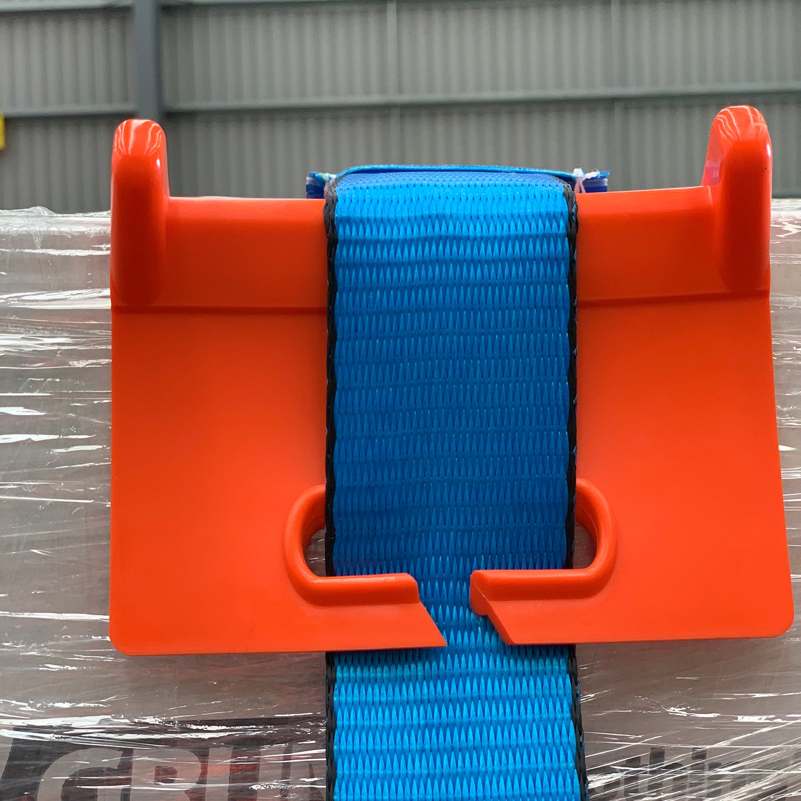 GRUNT 200mm Orange Open Edge Corner Tie Down Protector – heavy-duty corner protector for straps and tie-downs. Prevents cutting, fraying, and damage to straps over sharp edges during cargo transport. Available at Bunnings AU and NZ.