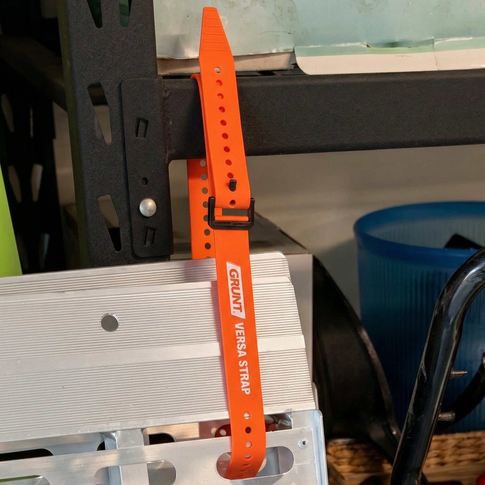 GRUNT 20mm x 60cm Orange Versa Strap – medium-length reusable hook-and-loop strap for bundling hoses, cables, and tools. Versatile for workshop, camping, and automotive applications. Available at Bunnings AU and NZ.