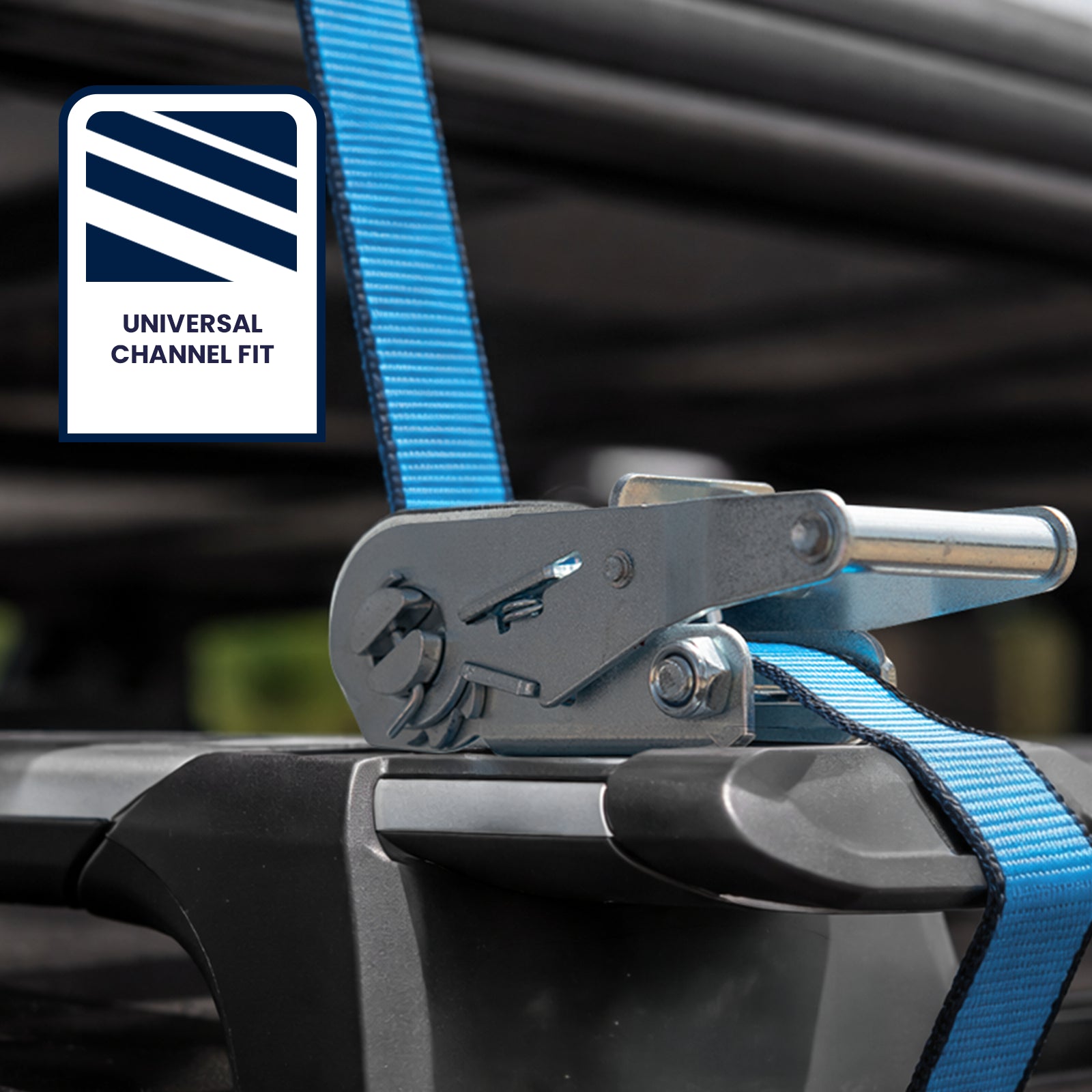 GRUNT 25mm x 2m Blue T Slot Roof Ratchet Tie Down – T-slot compatible ratchet strap for securing loads to roof racks and cargo rails. Easy-to-install T-bolt for tool-free attachment. Available at Bunnings AU and NZ.