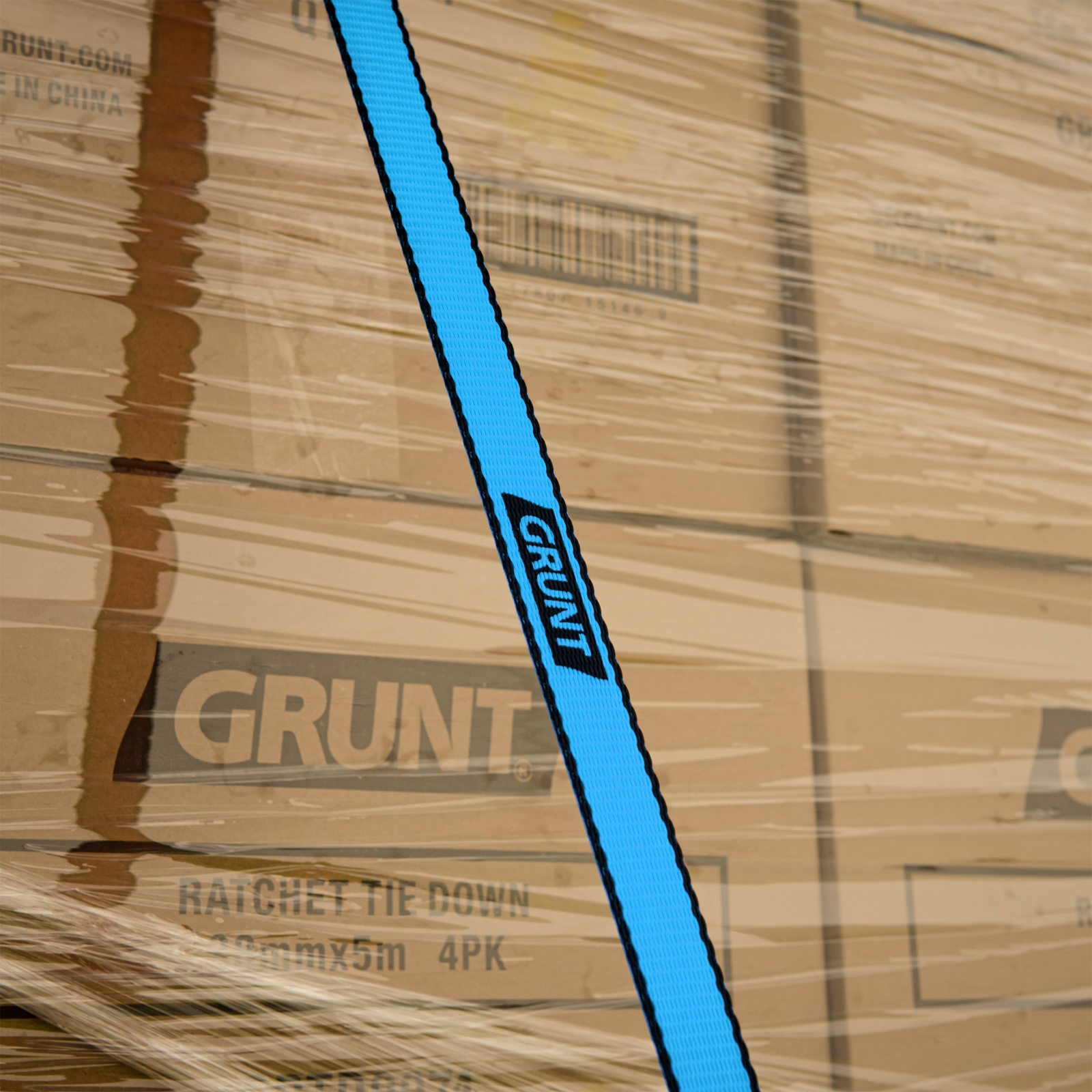 GRUNT 25mm x 4m Blue and Black Ratchet Tie Down Straps 2-Pack – compact ratchet straps for securing light-to-medium loads on trailers, utes, and roof racks. Easy-to-use ratchet mechanism. Available at Bunnings AU.