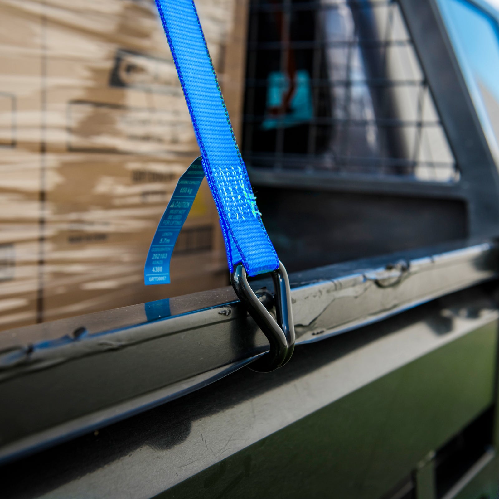 GRUNT 38mm x 6m Blue Ratchet Tie Down 2-Pack – strong mid-width ratchet straps for securing furniture, appliances, and equipment during transport. Reliable hook-and-ratchet system. Available at Bunnings AU and NZ.