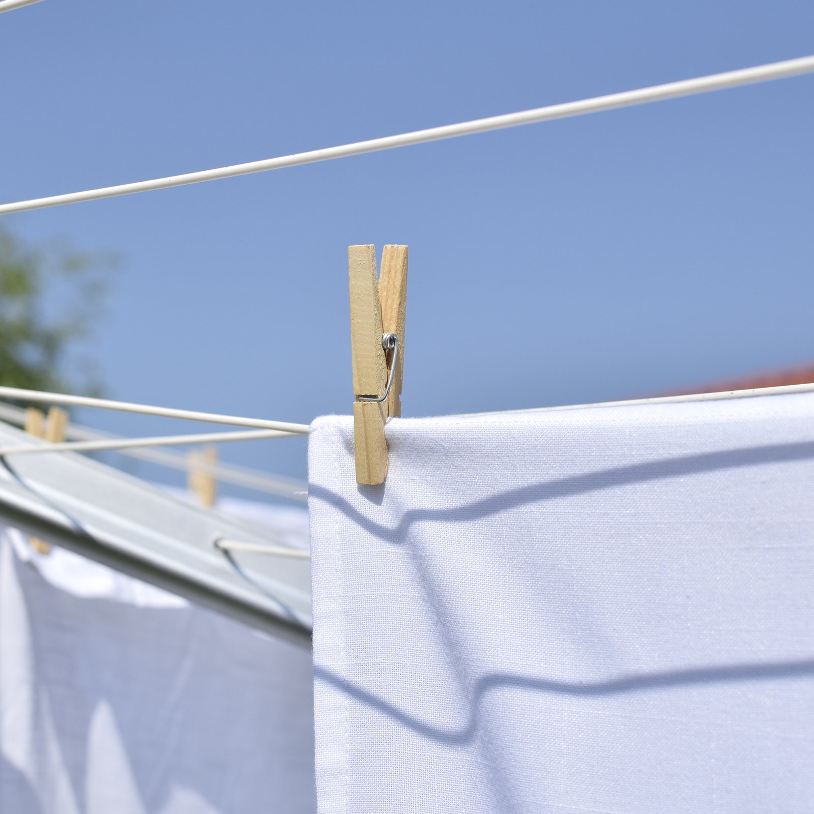 Grunt white poly core clothesline wire 4mm x 30m roll with durable PVC coating designed for outdoor clotheslines and long-lasting laundry drying use. Available at Bunnings AU and NZ.