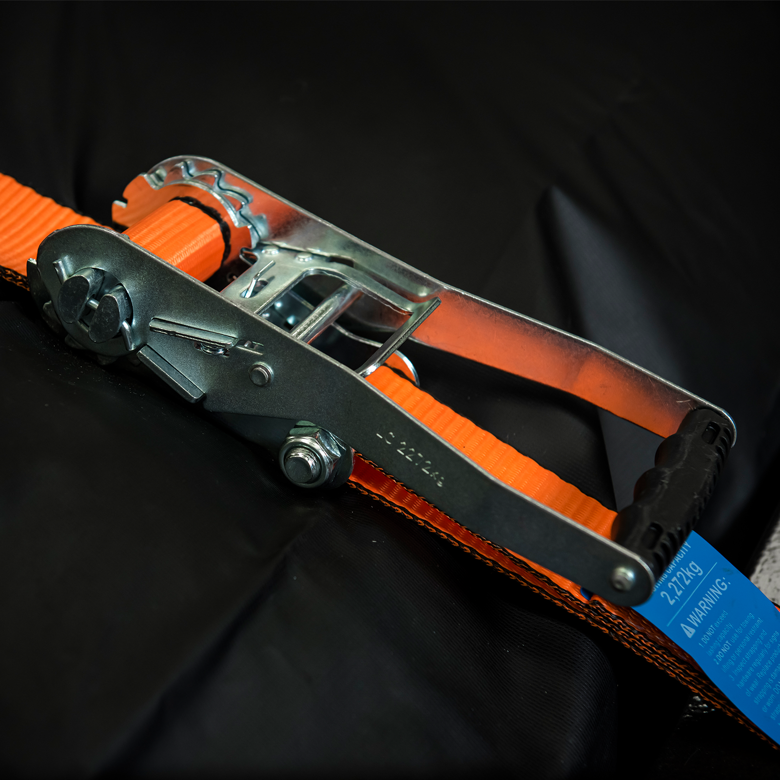 GRUNT 50mm x 8m Orange Heavy Duty Ratchet Tie Down – extra-wide long-length ratchet strap for securing heavy loads, vehicles, and machinery. High working load for professional transport. Available at Bunnings AU and NZ.