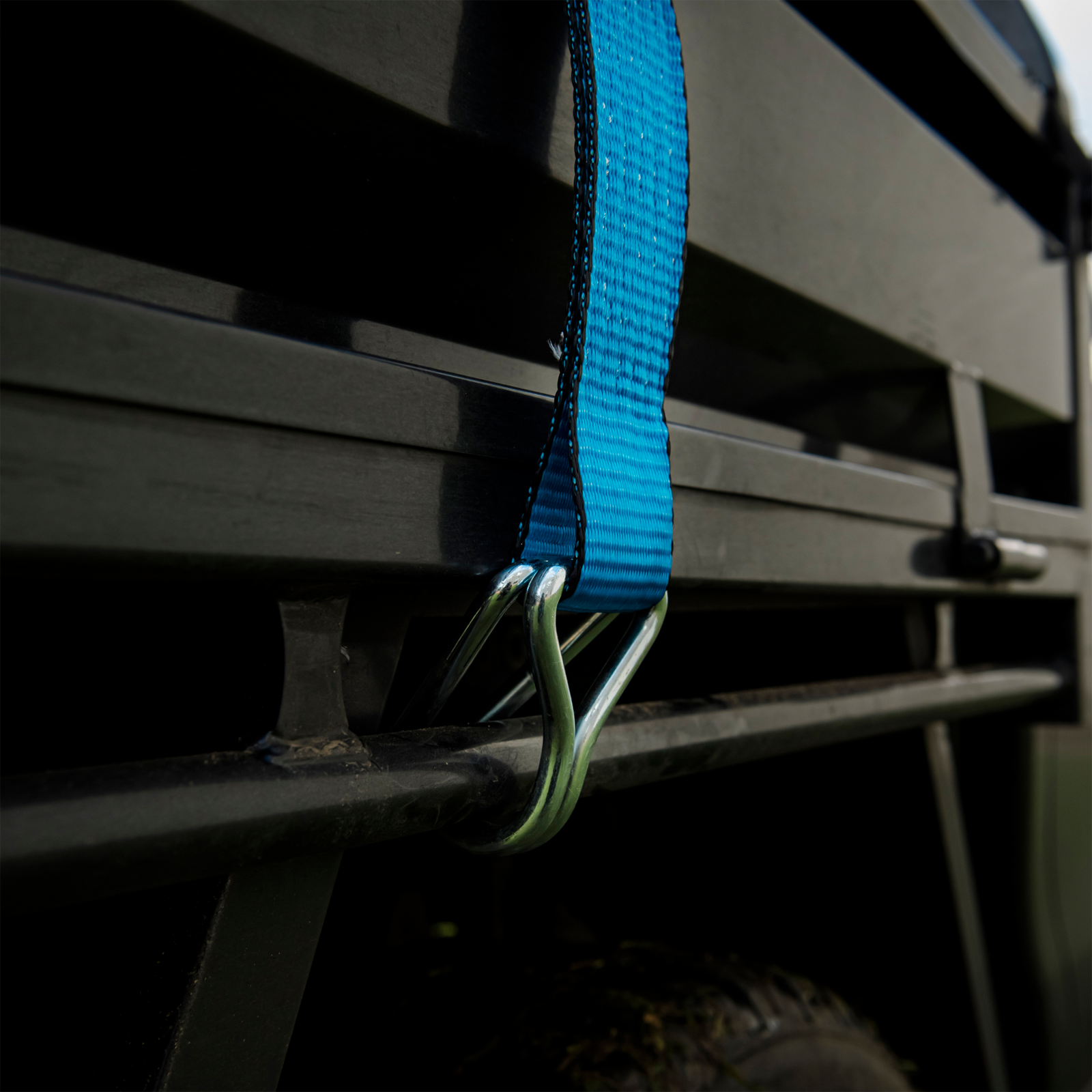GRUNT 50mm x 9m Blue and Yellow Heavy Duty Ratchet Tie Down – long-reach extra-wide ratchet strap for securing heavy machinery, furniture, and large loads on trailers and trucks. Available at Bunnings AU and NZ.