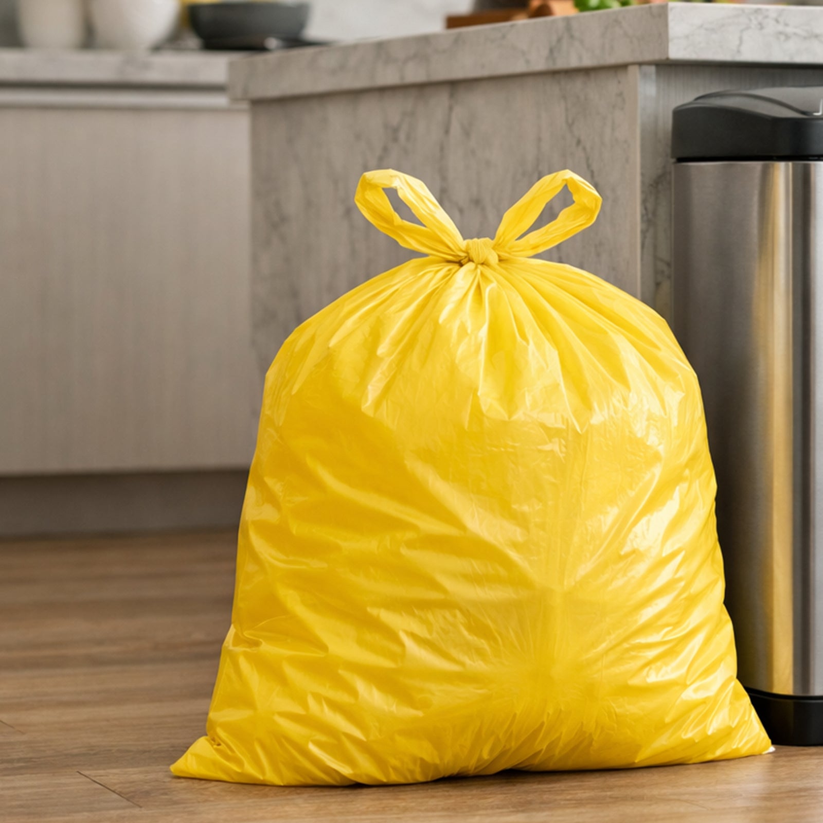 GRUNT 40L Yellow Lemon Scented Tie Top Rubbish Bags 50-Pack – fresh-scented tie-top bin liners for large kitchen bins. Odour-neutralising lemon fragrance with convenient built-in tie strips. Available at Bunnings AU and NZ.