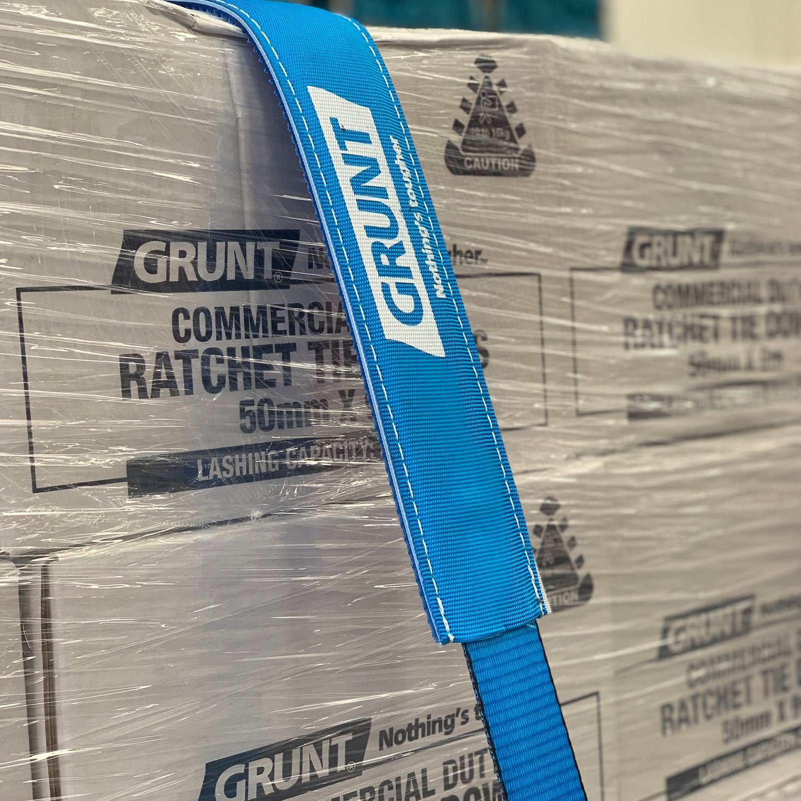 GRUNT 75 x 40cm Blue Super Grip Webbing Protector – large anti-slip webbing sleeve for protecting tie-down straps over sharp load edges. Prevents strap damage and extends service life. Available at Bunnings AU.