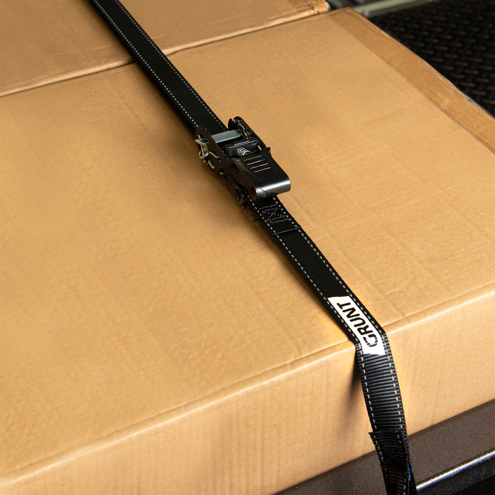 GRUNT Pro 25mm x 4m Black Ratchet Tie Down Straps 4-Pack – professional value 4-pack of ratchet straps for securing bikes, light cargo, and equipment on trailers. Reliable and compact. Available at Bunnings NZ.