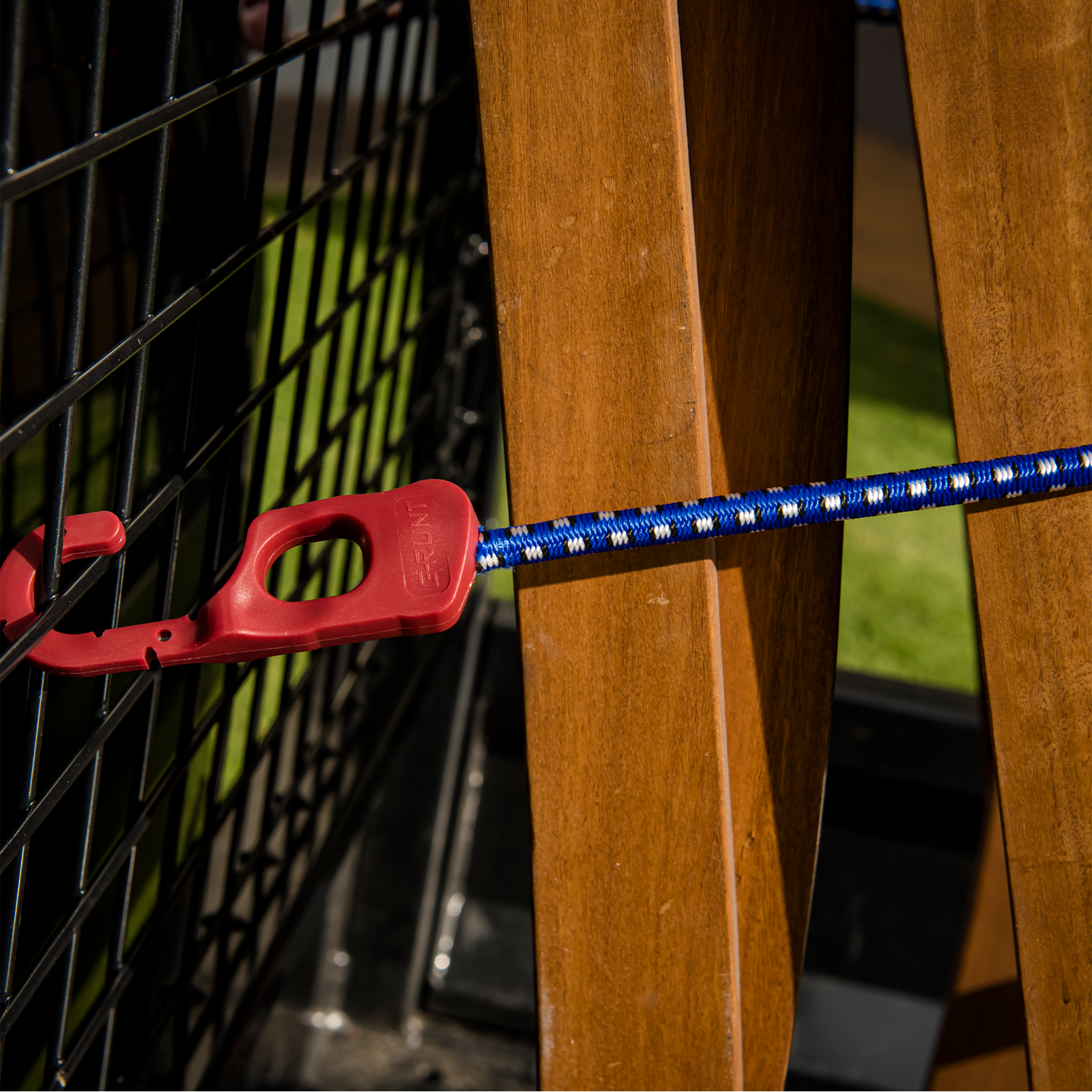 GRUNT 1000mm Blue and Black Octopus Tie Down Straps 2-Pack – multi-hook elastic straps for securing camping gear, bikes, and loads to racks and trailers. Versatile and easy to attach. Available at Bunnings AU and NZ.