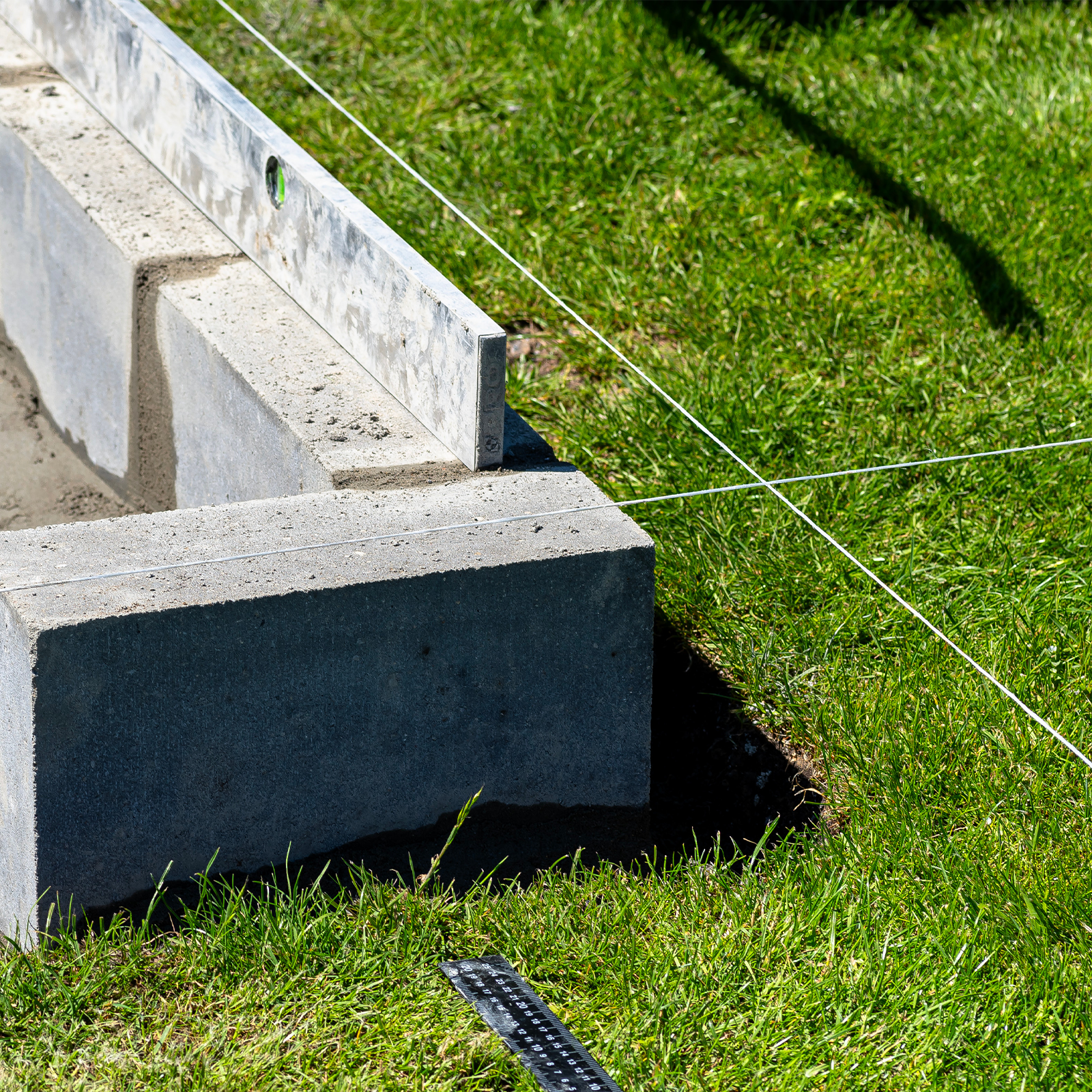 GRUNT 100m White Builders Brickies Nylon Line – long-run high-tensile nylon string line for bricklaying, construction layout, and large site marking. UV-resistant and tangle-resistant. Available at Bunnings NZ.