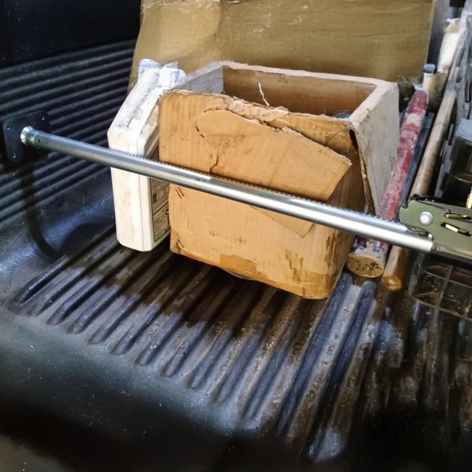 GRUNT 115mm Ratcheting Cargo Bar – adjustable spring-loaded cargo bar for securing loads in vans, utes, and trailers. Prevents load shifting without straps. Tool-free installation. Available at Bunnings AU and NZ.