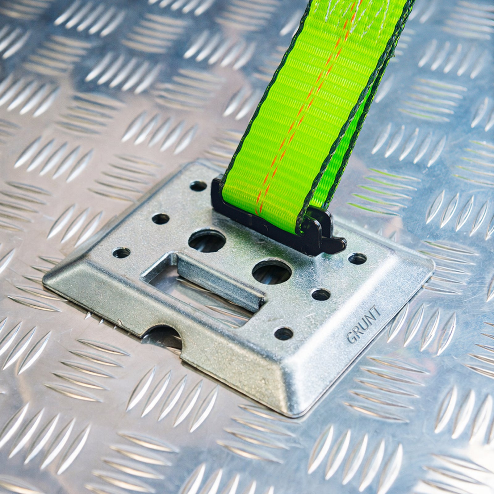 GRUNT 160mm Silver E Track Versatile Fixing Plate – universal mounting plate for E-Track cargo systems in trailers and vans. Maximises load-securing flexibility and tie-down attachment options. Available at Bunnings AU.