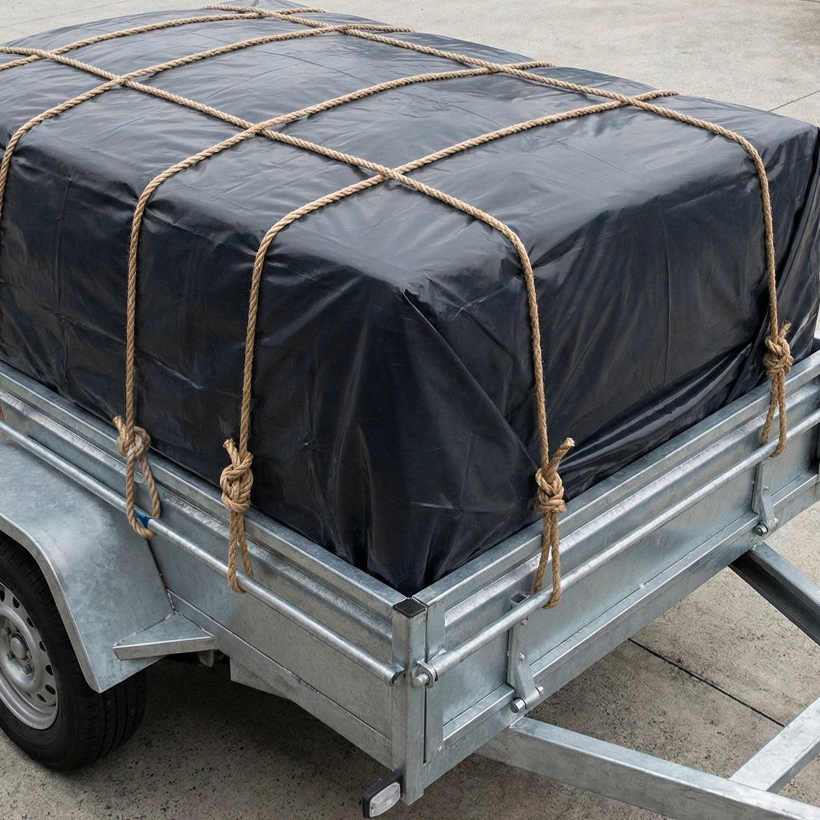 GRUNT 2m x 10m Black 140um Multi Use Plastic Film – mid-length extra-thick builders film for DPC, subfloor vapour barriers, and site waterproofing. Heavy-duty tear-resistant construction. Available at Bunnings AU.