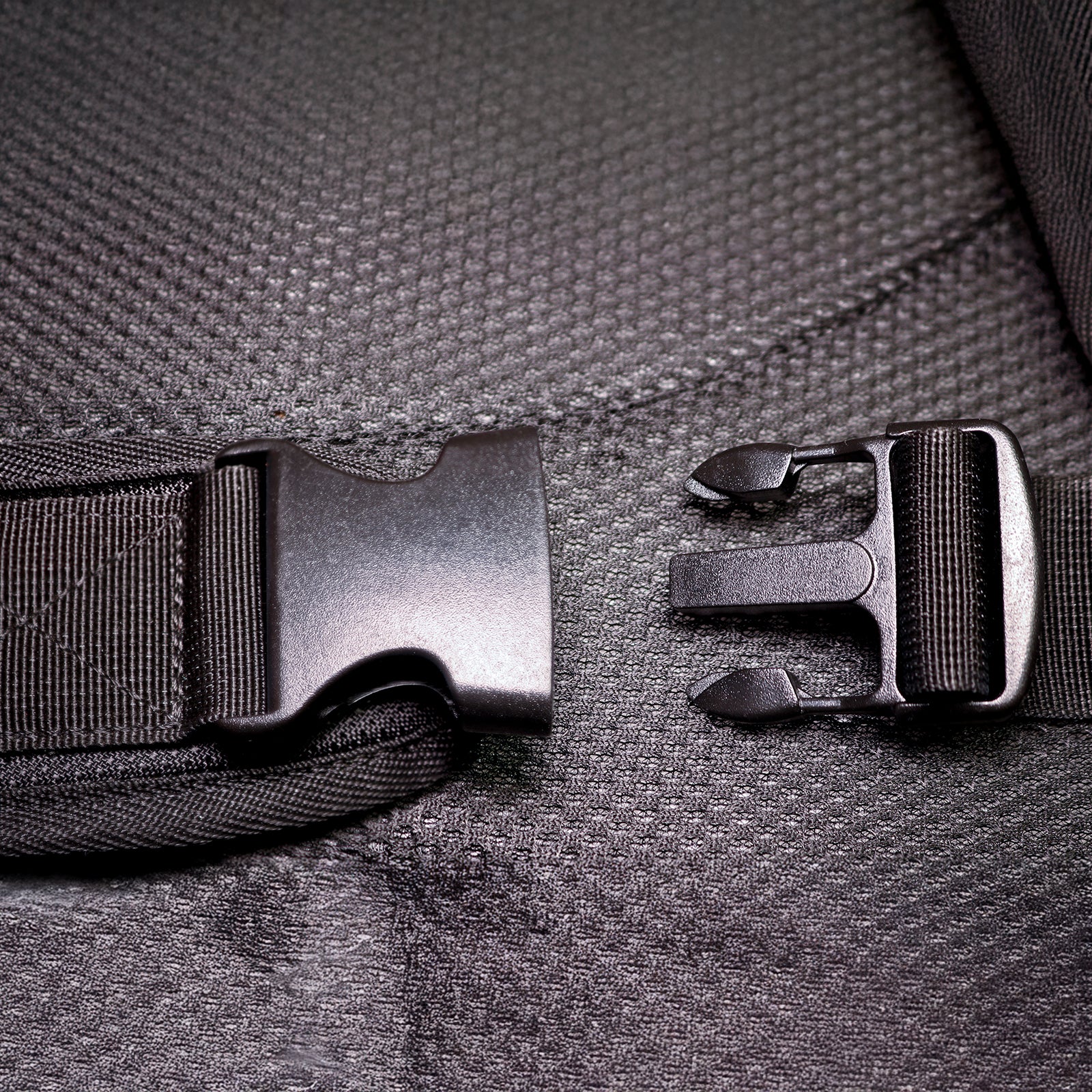 GRUNT 25mm Black Single Adjustable Side Release Buckle 2-Pack – lightweight side-release buckles for bags, backpacks, and 25mm webbing strap repairs. Easy one-click release. Available at Bunnings AU and NZ.