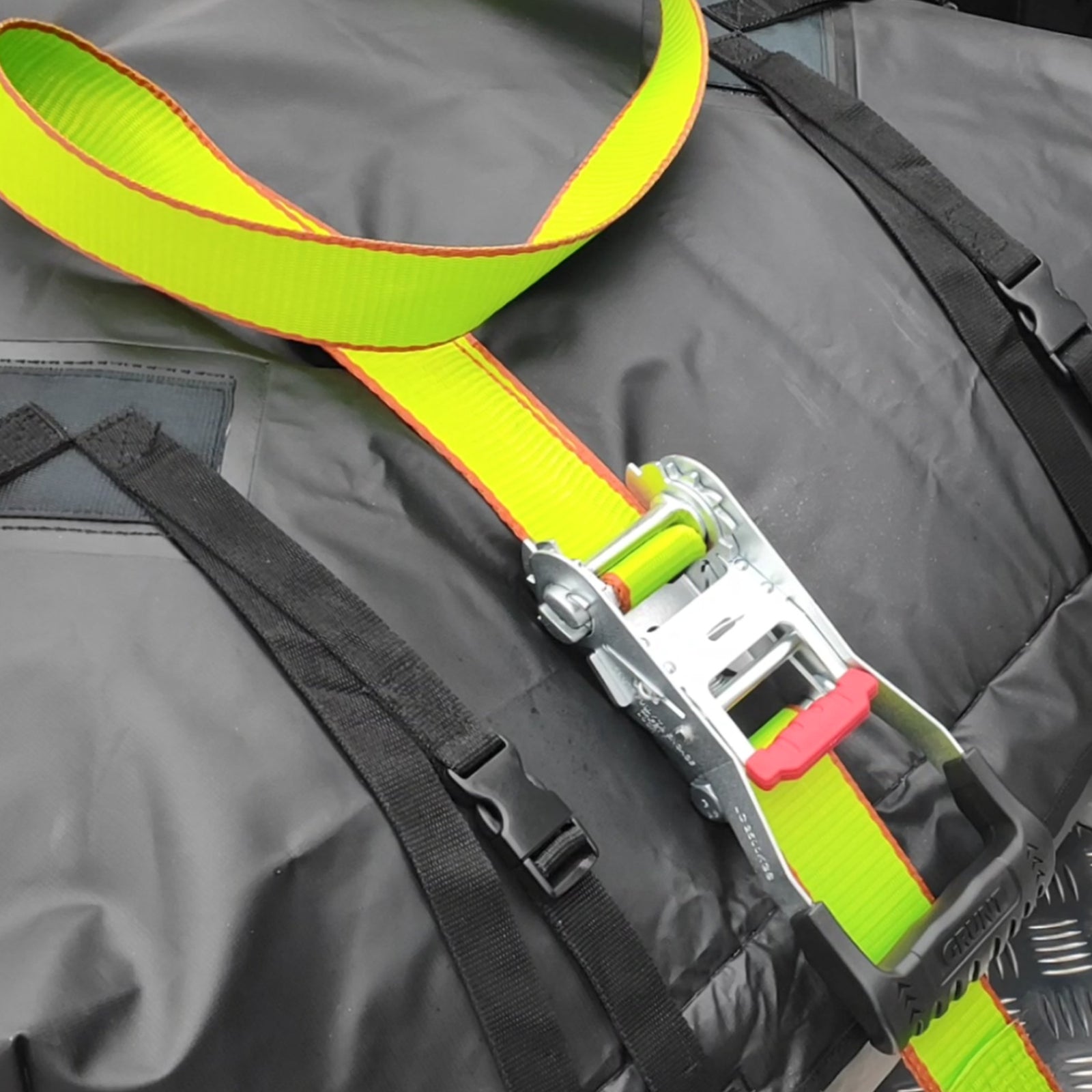 GRUNT Ezi-Load 25mm x 4m Green Ratchet Tie Down 2-Pack – easy-to-use ratchet straps with the Ezi-Load system for single-hand operation. Ideal for bikes and light cargo. Available at Bunnings AU and NZ.