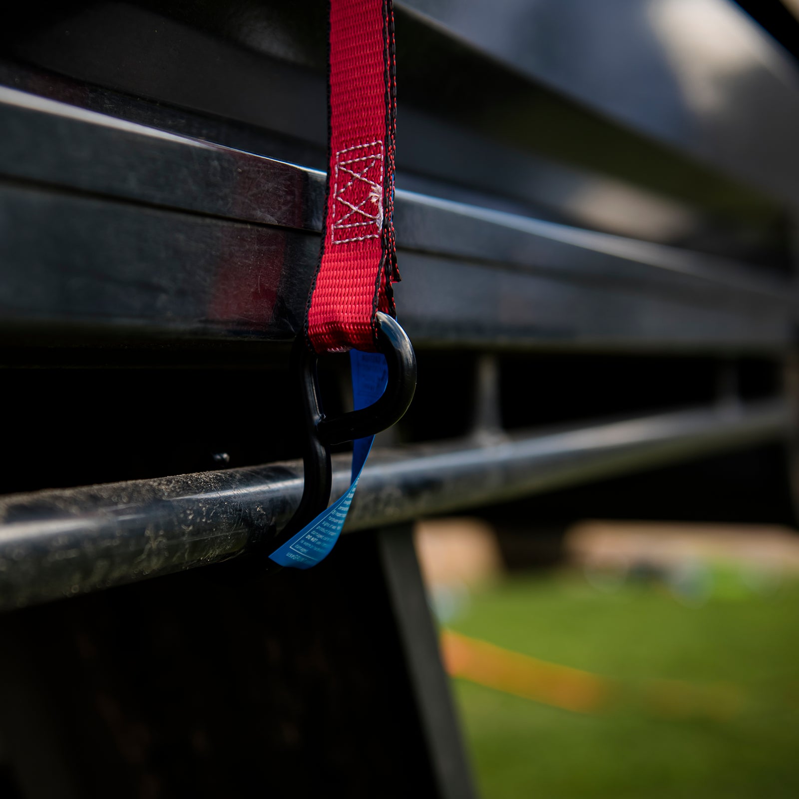 GRUNT 35mm x 5m Red Safety Auto Retractable Tie Down – self-retracting ratchet strap for tangle-free, single-hand load securing on trailers and utes. Auto-rewind for fast deployment and neat storage. Available at Bunnings AU and NZ.