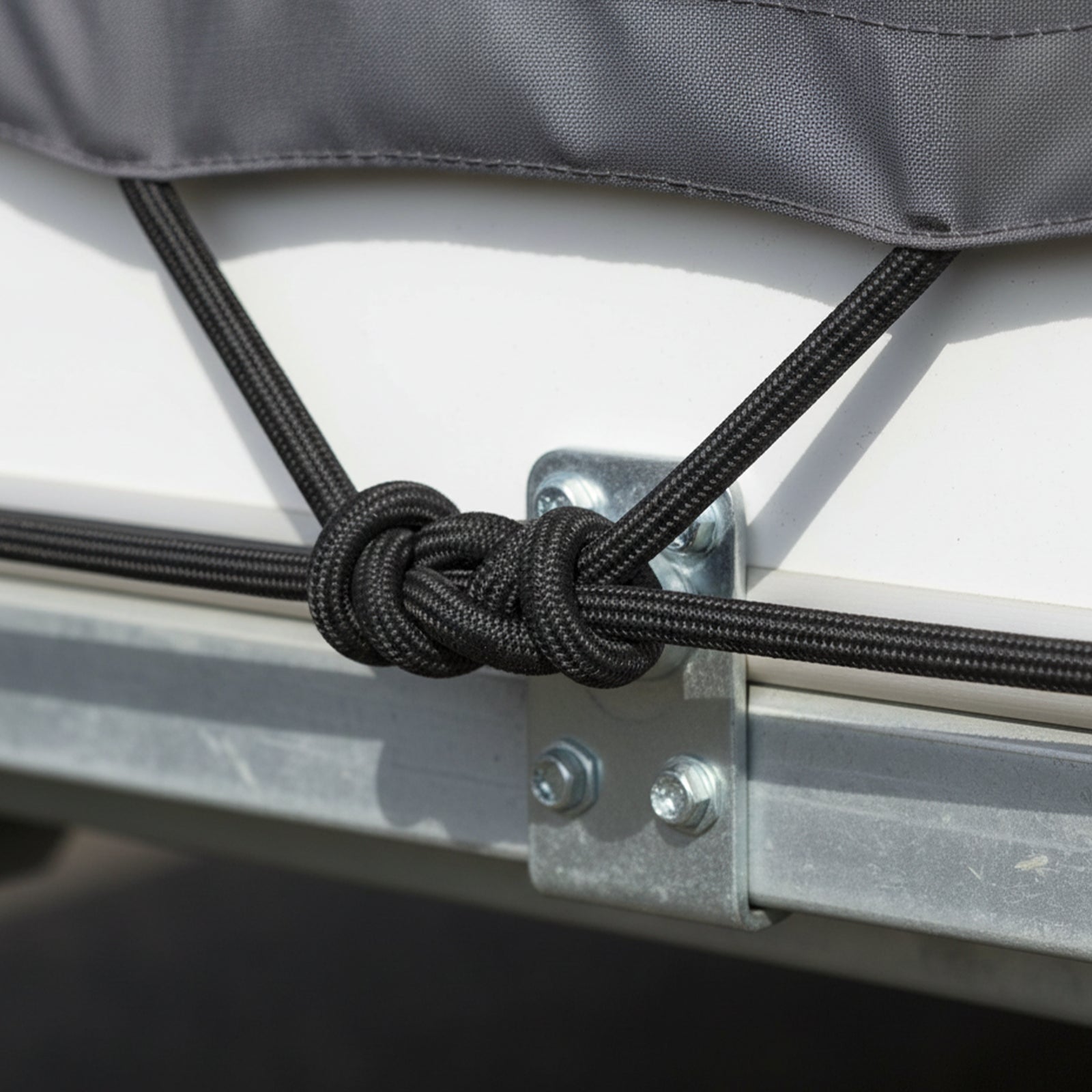 GRUNT 4mm x 20m Black Shock Cord – long-run elastic bungee cord for securing tarps, camping gear, and marine applications. Durable braided outer with rubber core. Available at Bunnings AU and NZ.