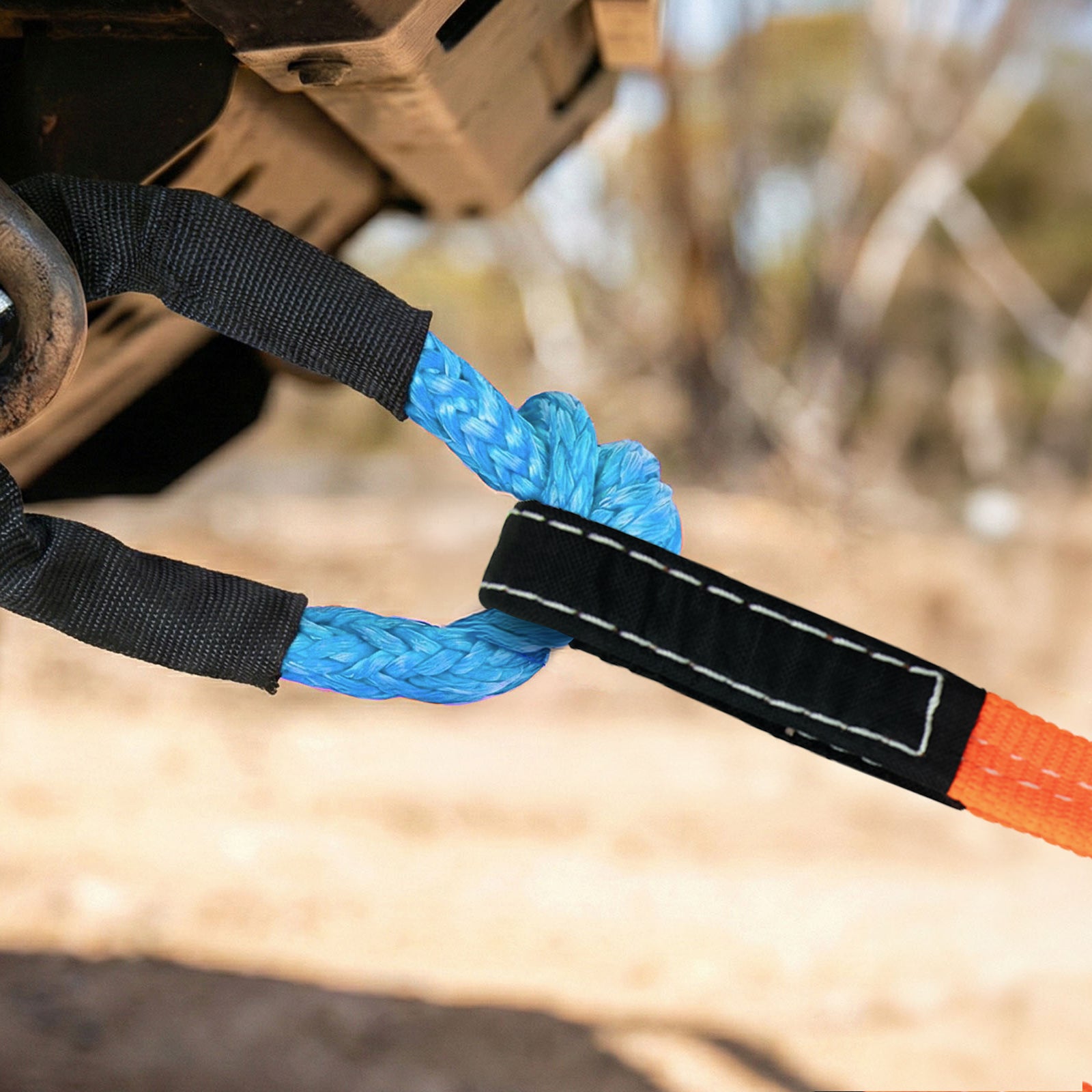 GRUNT 50mm Orange Heavy Duty Tow Strap – high-visibility heavy-duty polyester tow strap for vehicle recovery and towing. Strong loop ends for safe vehicle-to-vehicle attachment. Available at Bunnings AU and NZ.
