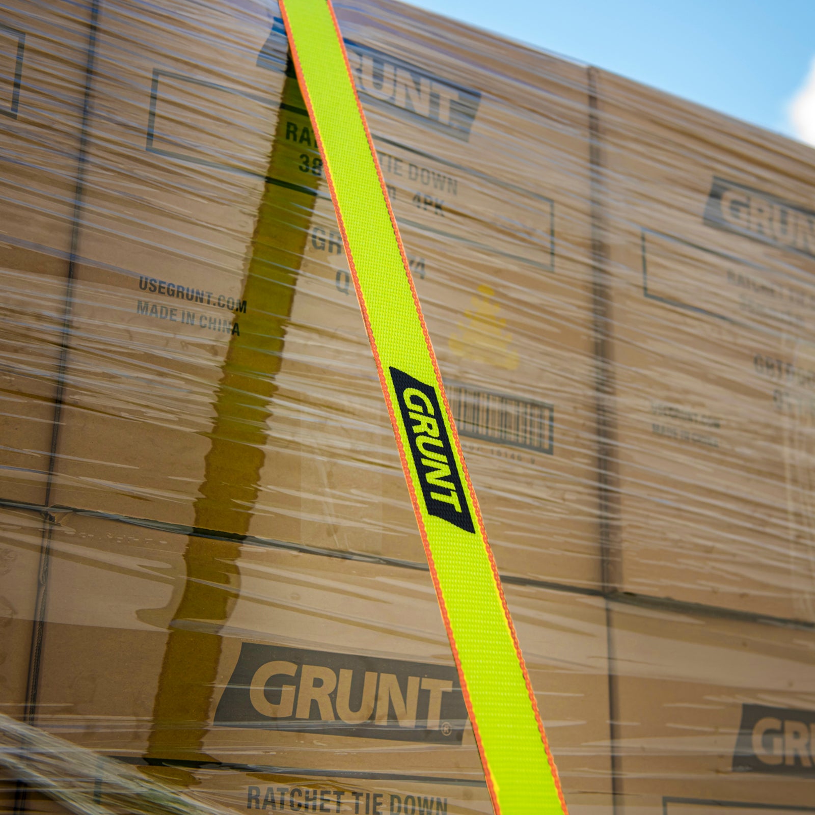 GRUNT Ezi-Load 50mm x 9m Green Heavy Duty Ratchet Tie Down – extra-wide long-reach ratchet strap with Ezi-Load single-hand system for securing heavy cargo and machinery. Available at Bunnings AU and NZ.