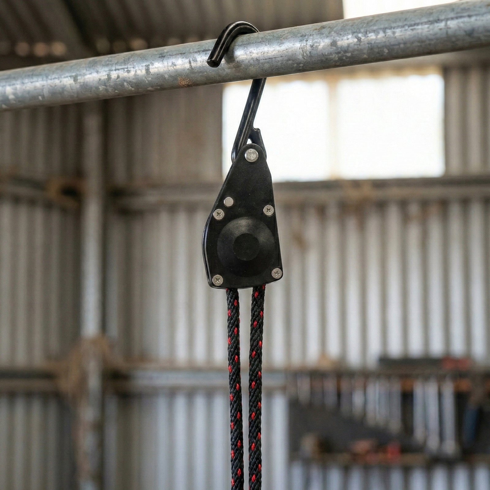 GRUNT 6mm x 240cm Black Rope Ratchet Tie Down – compact rope-style ratchet for securing motorcycles, bikes, and light loads. Easy-to-use ratchet mechanism for quick and secure fastening. Available at Bunnings AU and NZ.