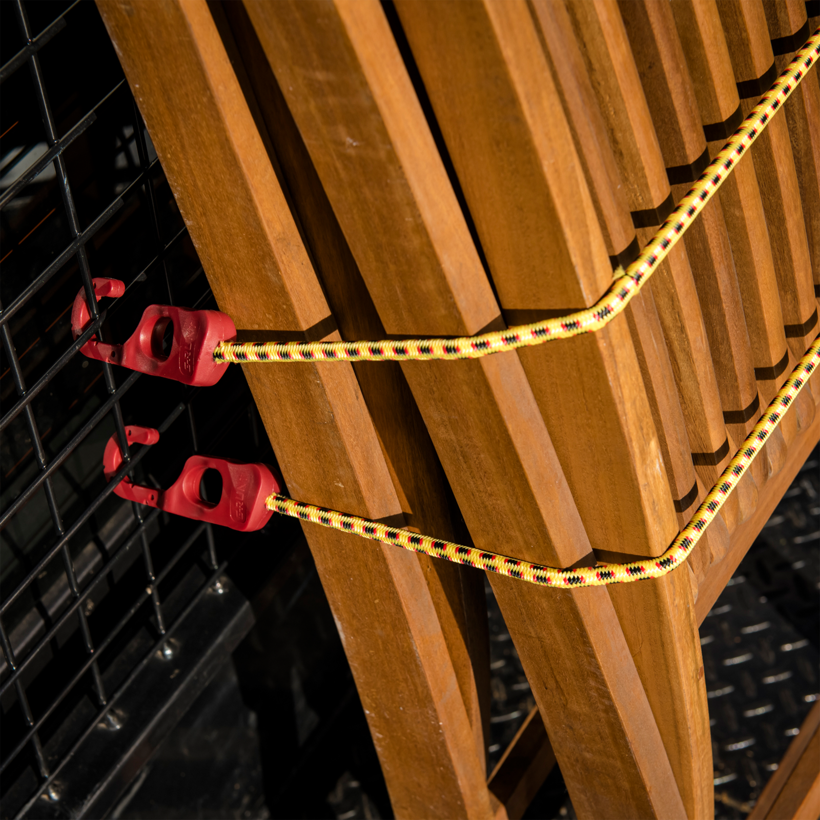 GRUNT 750mm Yellow and Black Octopus Tie Down Straps 2-Pack – multi-hook elastic bungee straps for securing loads on bikes, trailers, and ute trays. Fast and flexible load securing. Available at Bunnings AU and NZ.