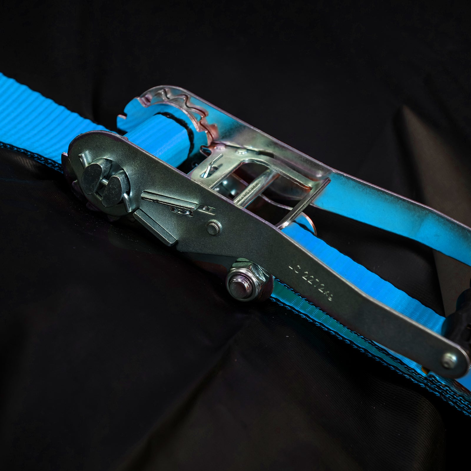 GRUNT 75mm x 10m Blue and Yellow Extreme Heavy Duty Ratchet Tie Down – maximum-strength extra-wide ratchet strap for securing excavators, machinery, and heavy plant. Top-of-range load restraint. Available at Bunnings AU and NZ.