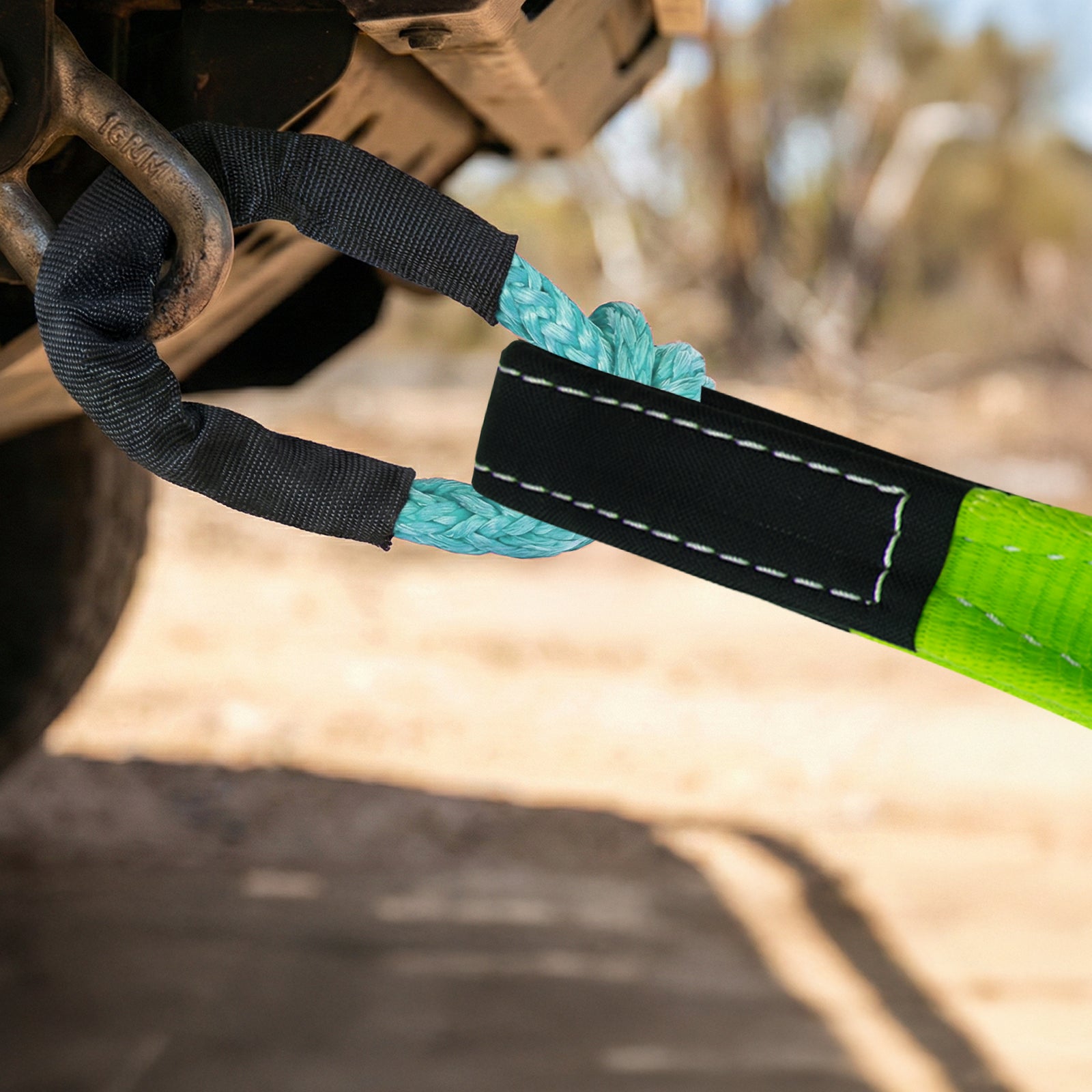 GRUNT 75mm x 9m Green Recovery Strap – 10000kg 4WD recovery strap for vehicle extraction from mud, sand, and off-road terrain. Heavy-duty nylon construction for safe and efficient recovery. Available at Bunnings AU and NZ.