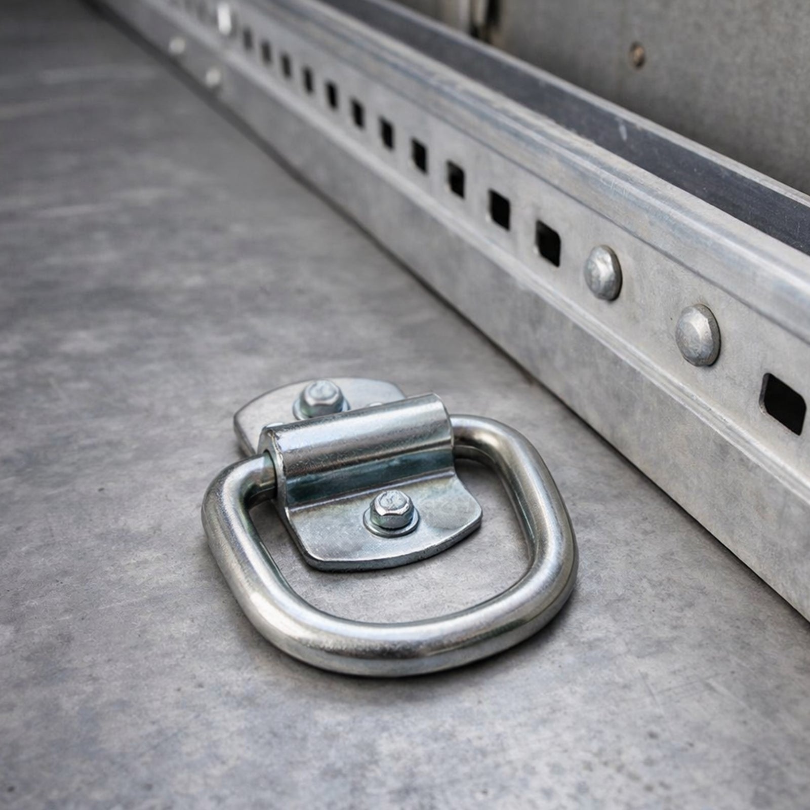 GRUNT Galvanised Steel Heavy Duty Ring Anchor Point – corrosion-resistant steel ring for trailer, ute tray, and vehicle load securing. High working load limit for professional tie-down use. Available at Bunnings AU and NZ.